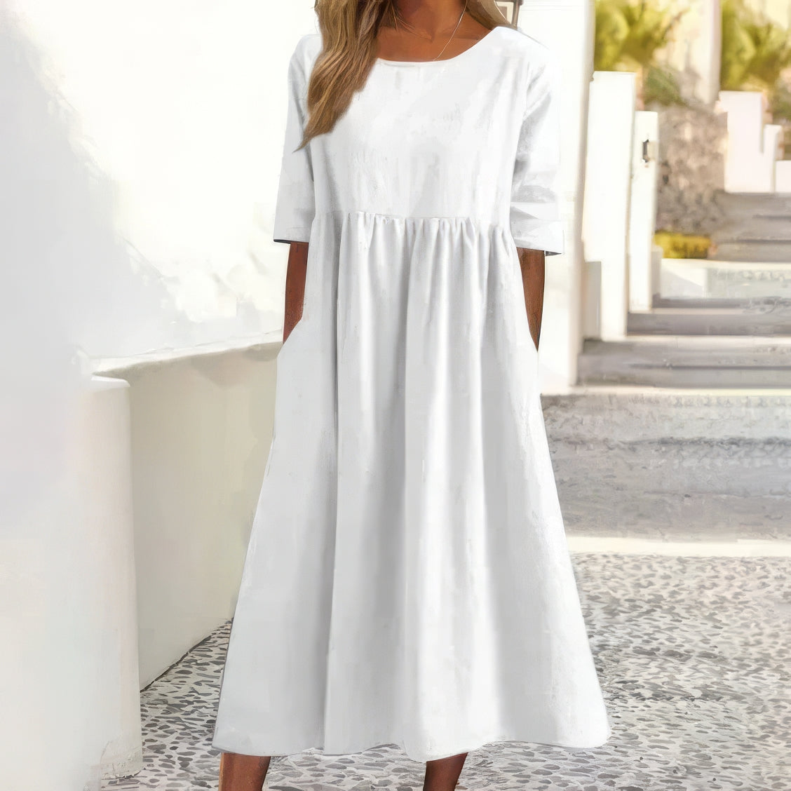 Robe en coton avec col rond et poches